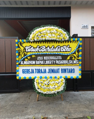 Papan Bunga Duka di Mertelu